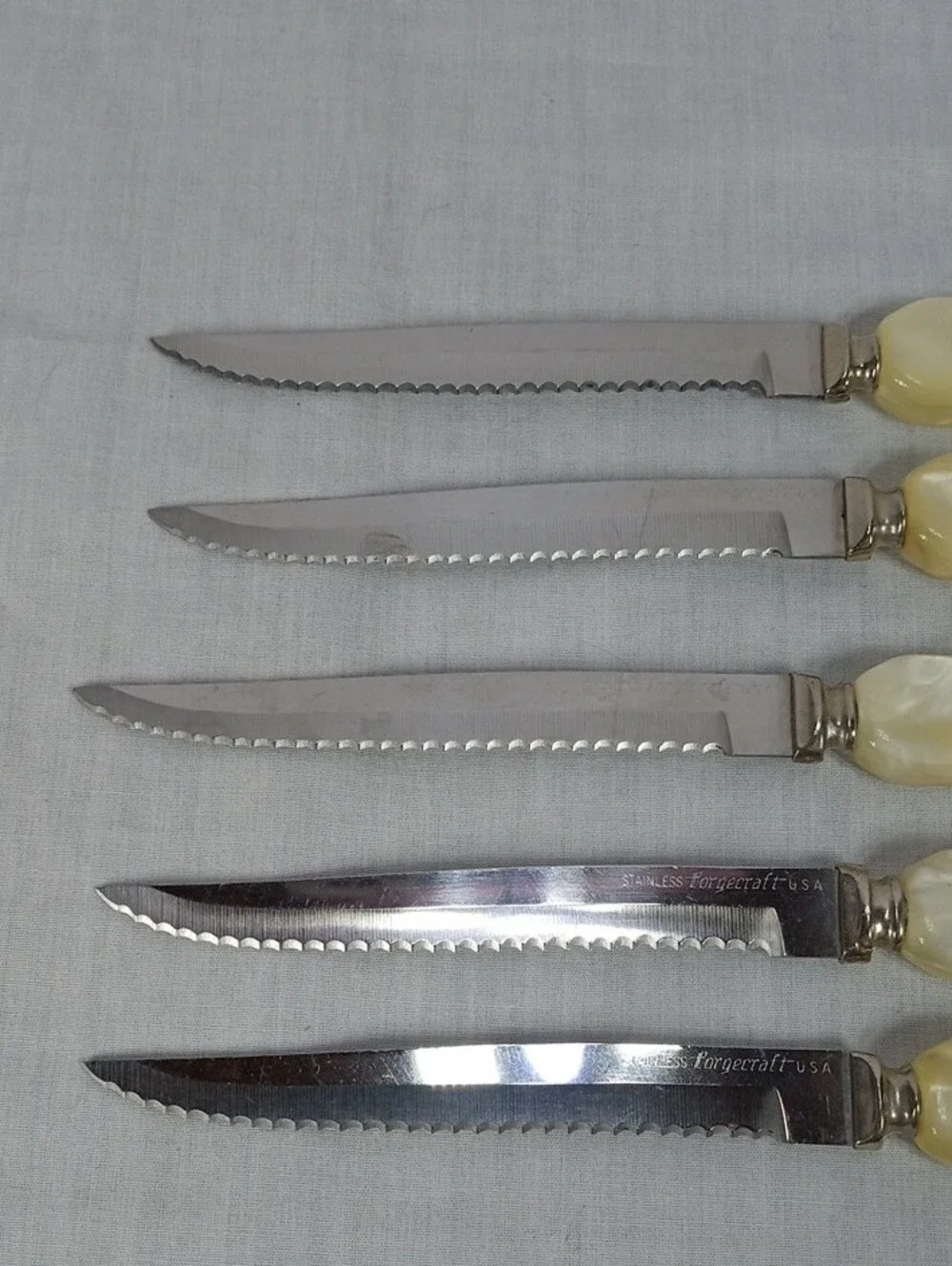 Set of 5 Forgedcraft StainlessYellow Pearlized Handle Steak Knives